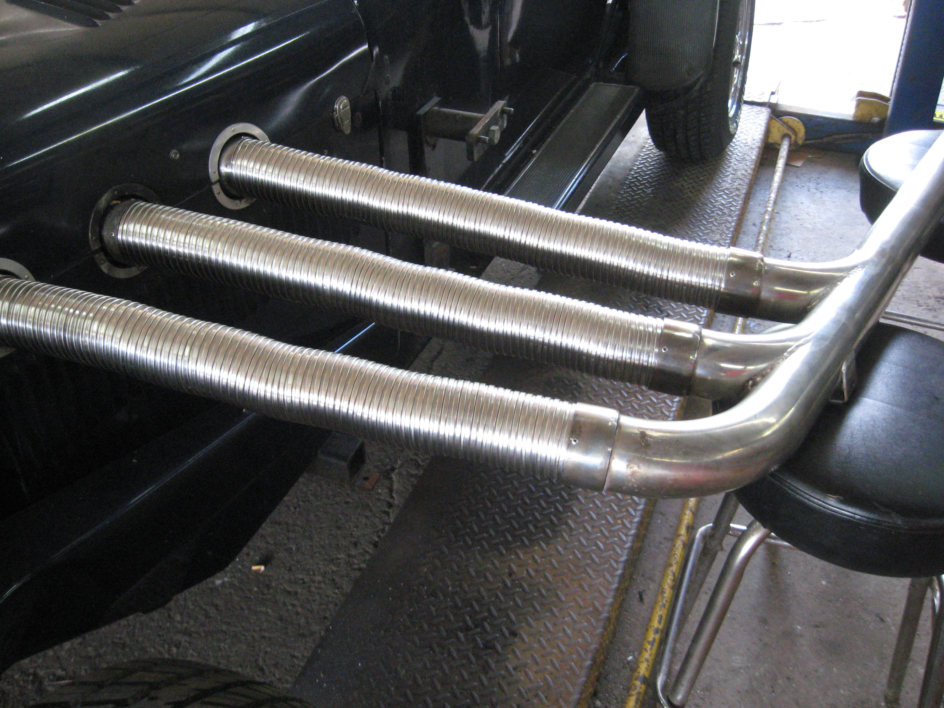 Automotive Exhaust Specialists work